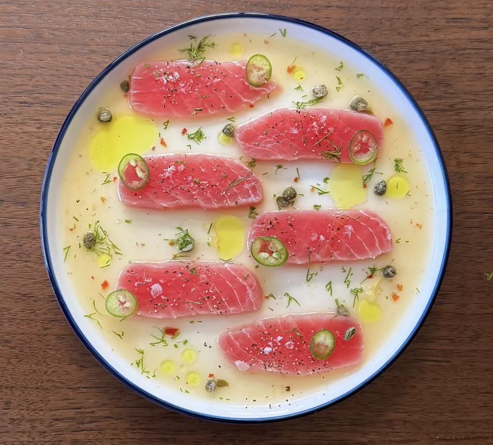 Citrus-cured tuna crudo with chilli and capers